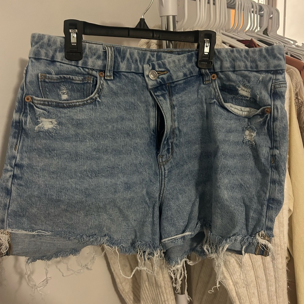 Washed Blue Distressed Denim Shorts - Women's